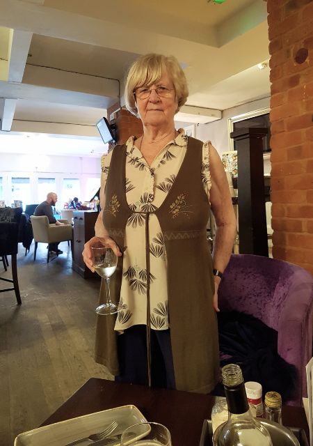 Kathleen at a fancy restaurant.