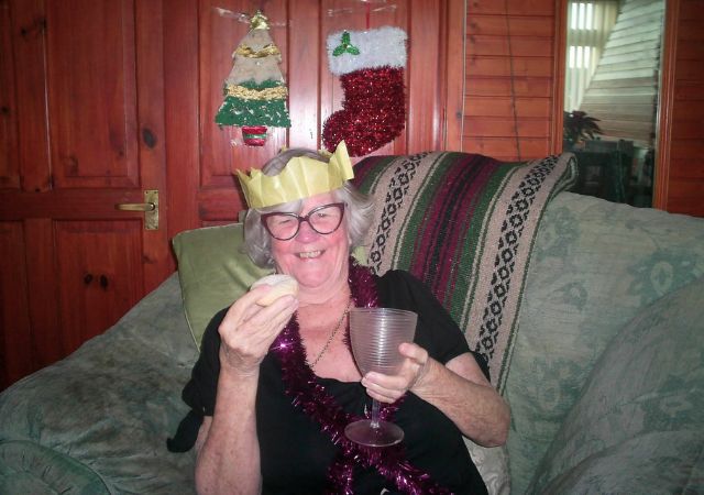 Kathleen enjoying a mince pie at Christmas. Seizures in elderly people.