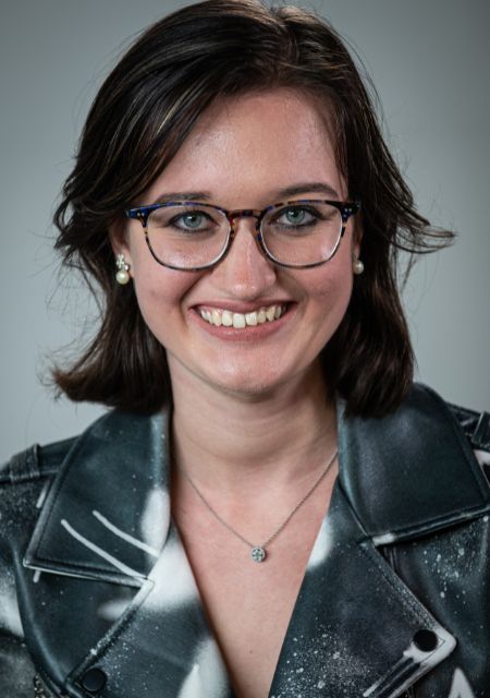 Emilia Potts smiling portrait photo sharing her personal epilepsy story