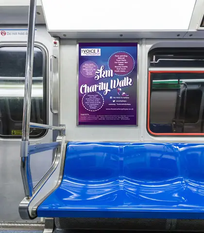 Train interior with charity event posters for epilepsy awareness