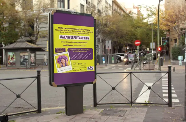 Street billboard displaying epilepsy awareness campaign poster