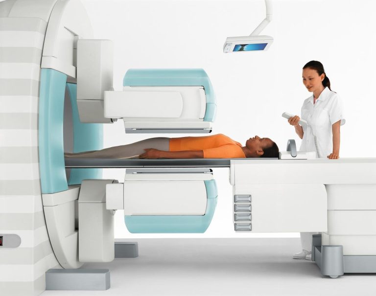 Patient undergoing SPECT scan nuclear imaging for epilepsy seizure focus localization and brain diagnosis