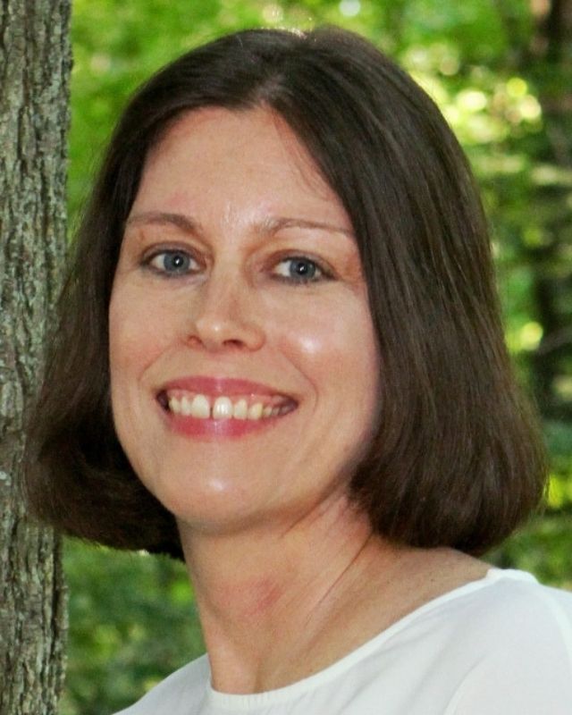 Amy Crane, author of In My Right Mind: My Life with Epilepsy, smiling portrait photo