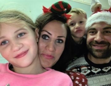 Happy family portrait of Ava and Harry with siblings, showing love and support whilst living with epilepsy