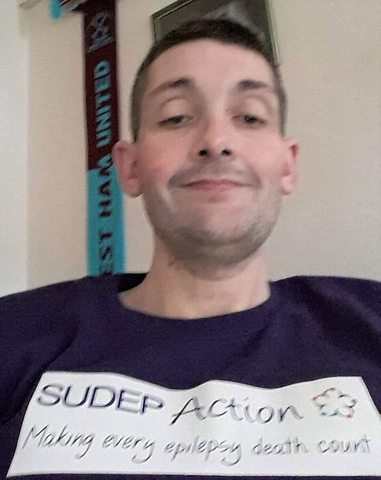 Jason Hughes wearing SUDEP Action t-shirt supporting epilepsy awareness Making Every Epilepsy Death Count campaign