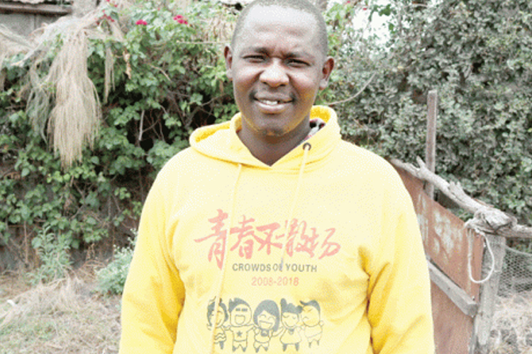 Young man wearing Crowds of Youth charity hoodie sharing his story of living with epilepsy